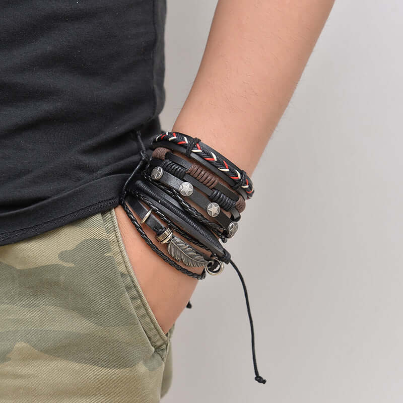 Multilayer leather bracelet for men featuring various textures and designs in black and brown tones.