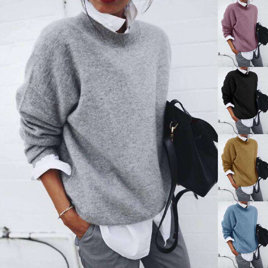 Women wearing stylish solid color long sleeve pullover sweater in fall and winter fashion