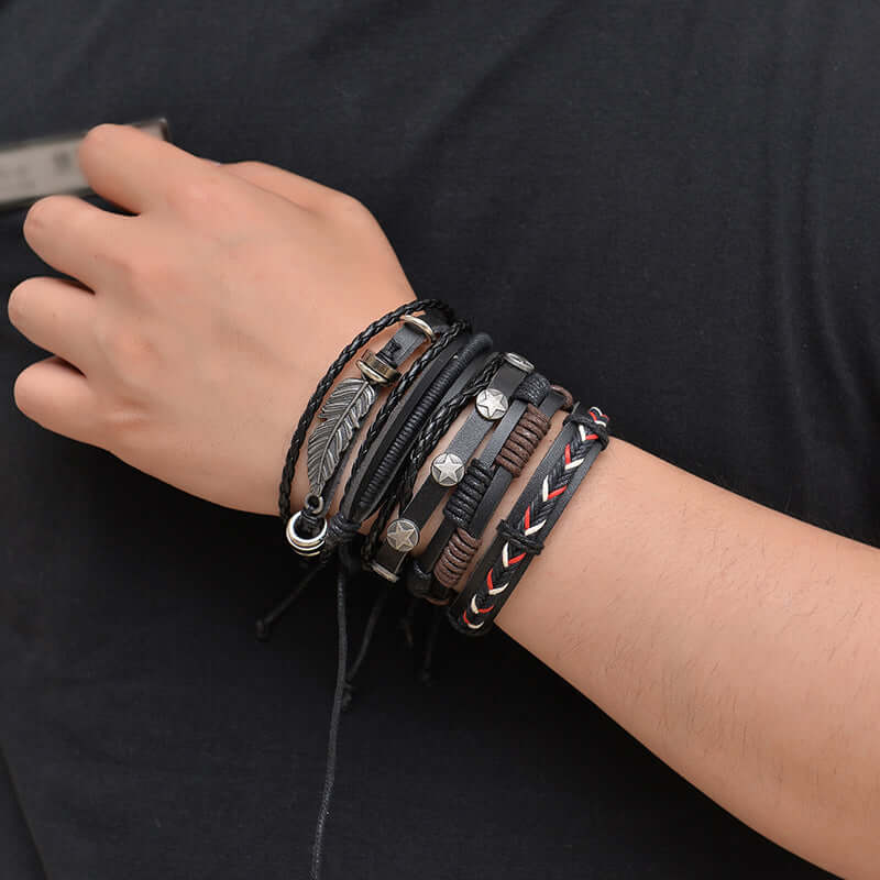 Multilayer leather bracelet for men displayed on a wrist with various styles and textures.
