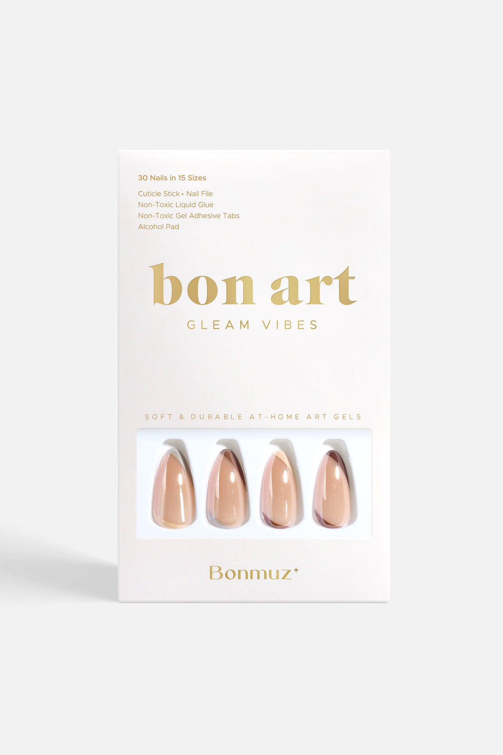 Set of medium stiletto nude press-on nails with soft neutral tones and angled accent